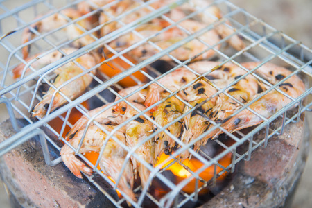 fresh shrimp on charcoal grill, seafoodの写真素材