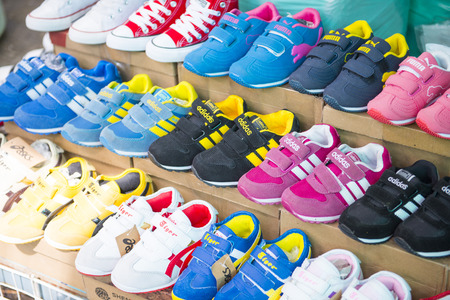 SAKAEO, THAILAND - MAY 21, 2016 : various sneaker in shop at Rong Kluea market, Sakaeo, Thailandのeditorial素材