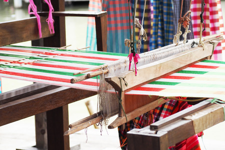 Loom weaving in thailand, traditional thai fabric tool