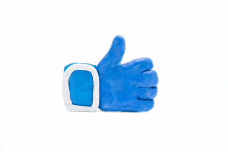 like icon by hand made from clay on white background