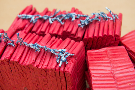 Red firecrackers on brown background, dangerousの写真素材