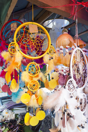 Colorful dream catchers hanging in shop for sale, decorationの写真素材