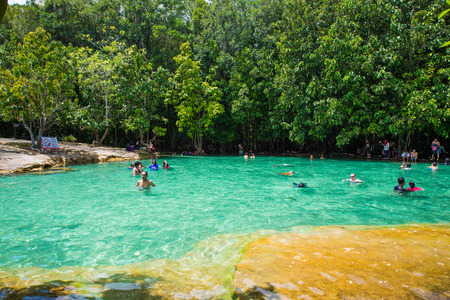 Krabi, Thailand - October 15, 2016 :A lot of tourists enjoy swimming in the emerald pool at Krabi, Thailandのeditorial素材