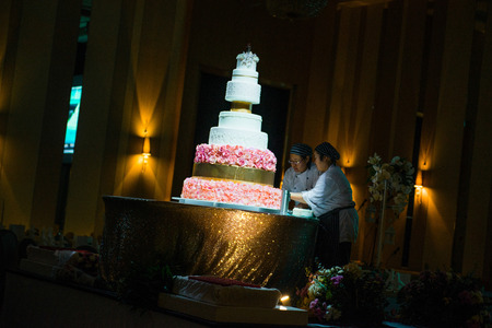 Bangkok, Thailand - December 3, 2016 :Wedding cake decorated with flower in ballroomのeditorial素材