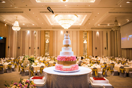 Bangkok, Thailand - December 3, 2016 :Wedding cake decorated with flower in ballroomのeditorial素材