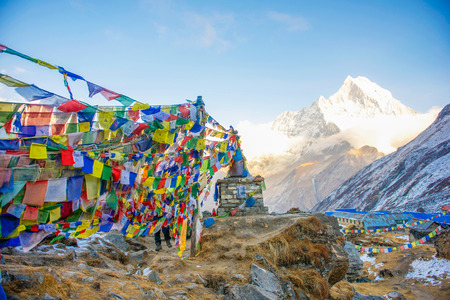 color prayer flags on top of Annapurna base camp , Nepal