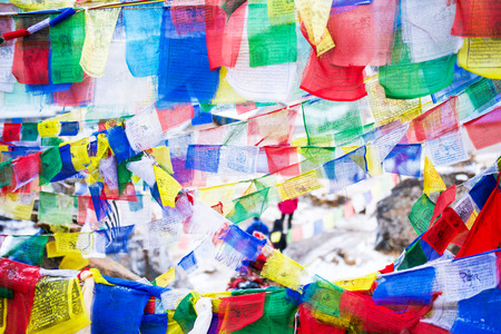 color prayer flags on top of Annapurna base camp , Nepalの写真素材