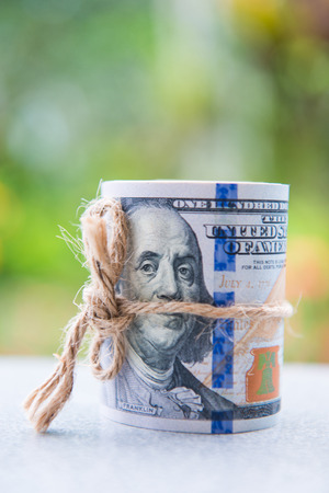 saving money with american dollars , cashの写真素材