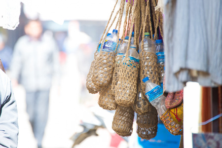 Nepal - 3 January 2017 :: hand made water bottle bag made from sack , Nepalのeditorial素材