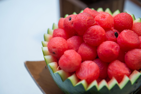 fresh watermelon balls in a cover of green watermelonの写真素材