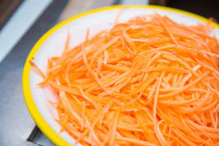 slice carrot fresh vegetable for salad , foodの写真素材