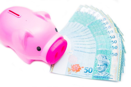 bank note of Ringgit Malaysia and piggy bank , money