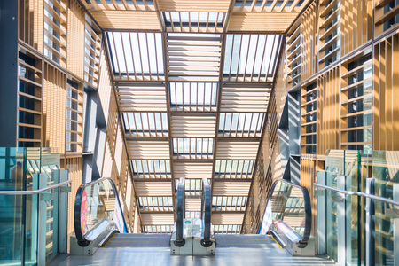 escalator - automatic staircase for up and down in building , elevatorのeditorial素材