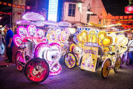 Malacca, Malaysia - February 21, 2016 :Trishaw is popular public transports around the Dutch Square Malacca, Malaysiaのeditorial素材