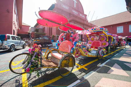 Malacca, Malaysia - February 21, 2016 :Trishaw is popular public transports around the Dutch Square...