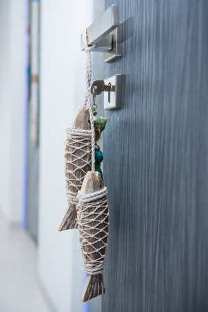 opening/closed door knob and keychain, door handleの写真素材