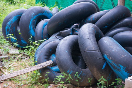 black swim ring made from tire , life ringの写真素材