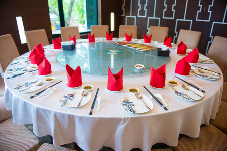 The round table set in chinese restaurant, decorationの写真素材