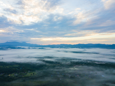 Landscape of misty mountain forest covered hills at khao khai nui, Phang-ngaの写真素材