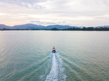 Aerial view or top view of tropical island with boat, Phuket island, Thailandの写真素材