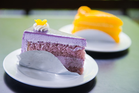 Homemade taro cake and orange cake, dessertの写真素材