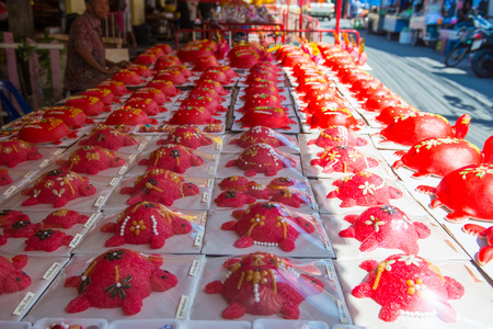 Phuket, Thailand - September 9, 2017 :Red turtle cake are used offerings to offer ancestors in Por Tor Festival of Phuket, Thailandのeditorial素材