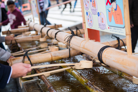 Kyoto, Japan - November 16, 2017 :Temizuya :: water ablution pavilion for a purify the soul in Japanese Shrineのeditorial素材