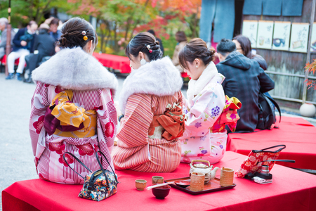 Kyoto, Japan - November 17, 2017: Kimono girls enjoy autumn red maple at Eikando temple, Kyoto, Japanのeditorial素材