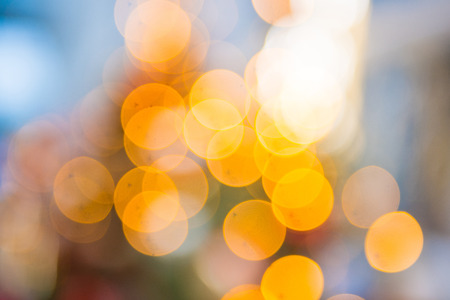blur bokeh light background on christmas treeの写真素材