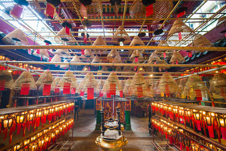 Central, Hong Kong - January 12, 2018 :Incense Coils and lantern is decorated inside of the Man Mo Temple in Sheung Wan, Hong Kongのeditorial素材