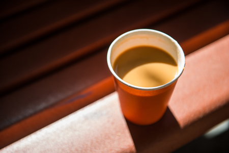 Hot coffee in the take away paper glass, drink