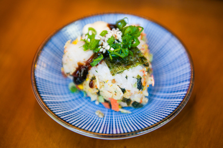 Triangle shaped rice with seaweed sushi, Onigiri Japanese food