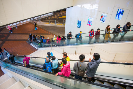 Hong Kong - January 14, 2018 :People in motion in escalators at the shopping mall, Hong Kong