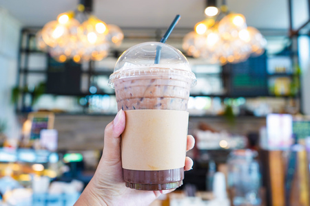Iced chocolate in plastic glass, beverage