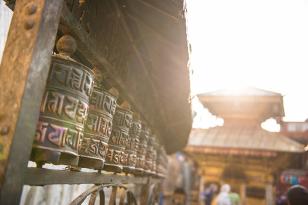 Buddhist prayer wheels at the Monkey Temple in Nepal, landmarkの写真素材