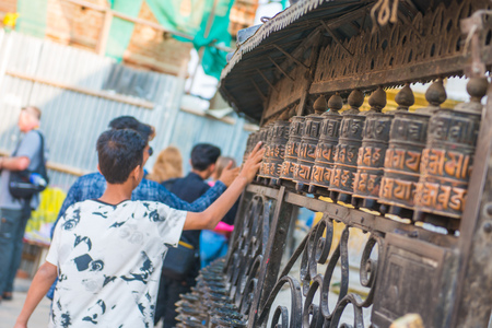 Kathmandu, Nepal, April 21, 2018 :Buddhist prayer wheels at the Monkey Temple in Nepal, landmarkのeditorial素材