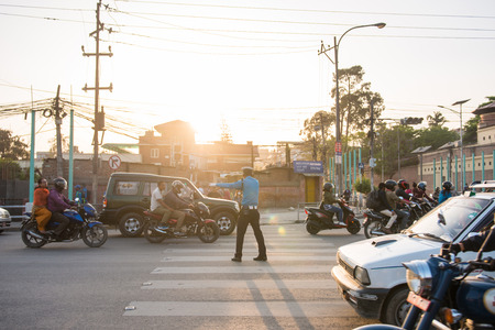 22 April 2018 - Nepal ::traffic police is working on the road, Kathmanduのeditorial素材