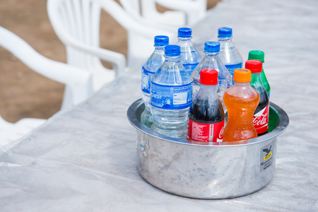 Nepal - April 15, 2018 :Water and soft drinks in a stainless pot, beverageのeditorial素材