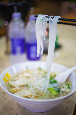 hot noodle with soup and meat ball, chinese foodの写真素材