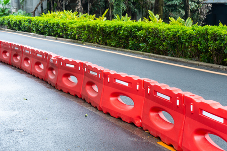 water barrier on the road in town, partitionの写真素材
