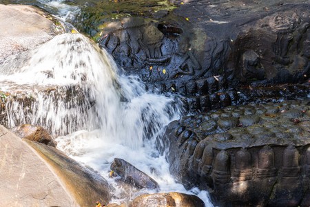 stone carvings in the river at Kbal Spean,Cambodiaの写真素材