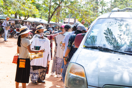 26 October 2018-Siem reap::trader sell souvenir to tourist at Ta Prohm temple,Angkor Thomのeditorial素材