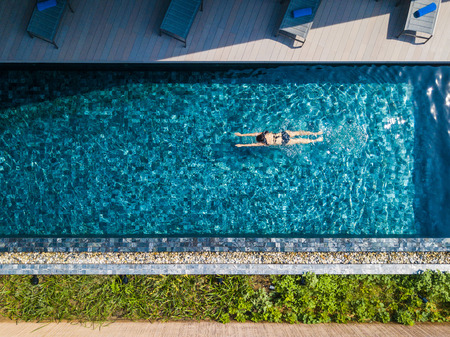 girl swim at swimming pool,pond