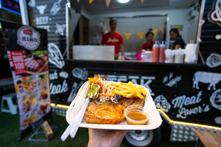 25 April 2019-Thailand::pork chop steak from food truck shop,foodのeditorial素材