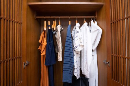 clothes hanger on the wood wardrobe,cabinet