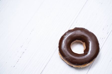 close up chocolate coating doughnut, bakedの写真素材