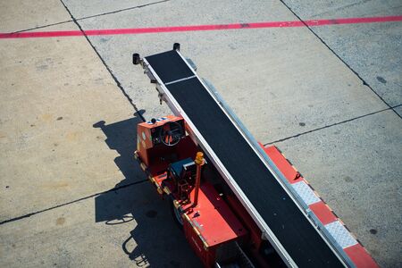 bag conveyors car at airport,plane