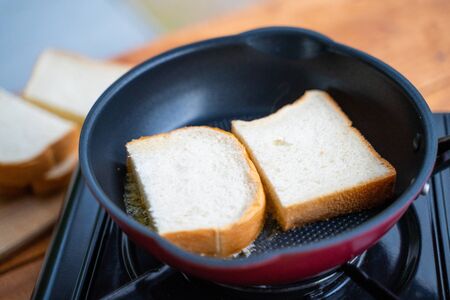 bake parmesan cheese toast by pan,breadの写真素材