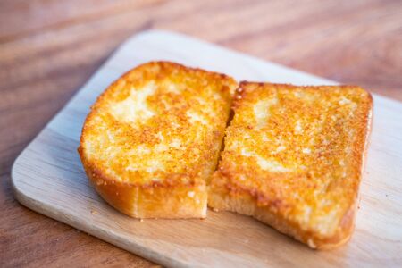 bake parmesan cheese toast by pan,breadの写真素材