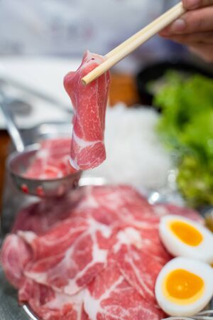 sliced pork for cooking shabu,foodの写真素材